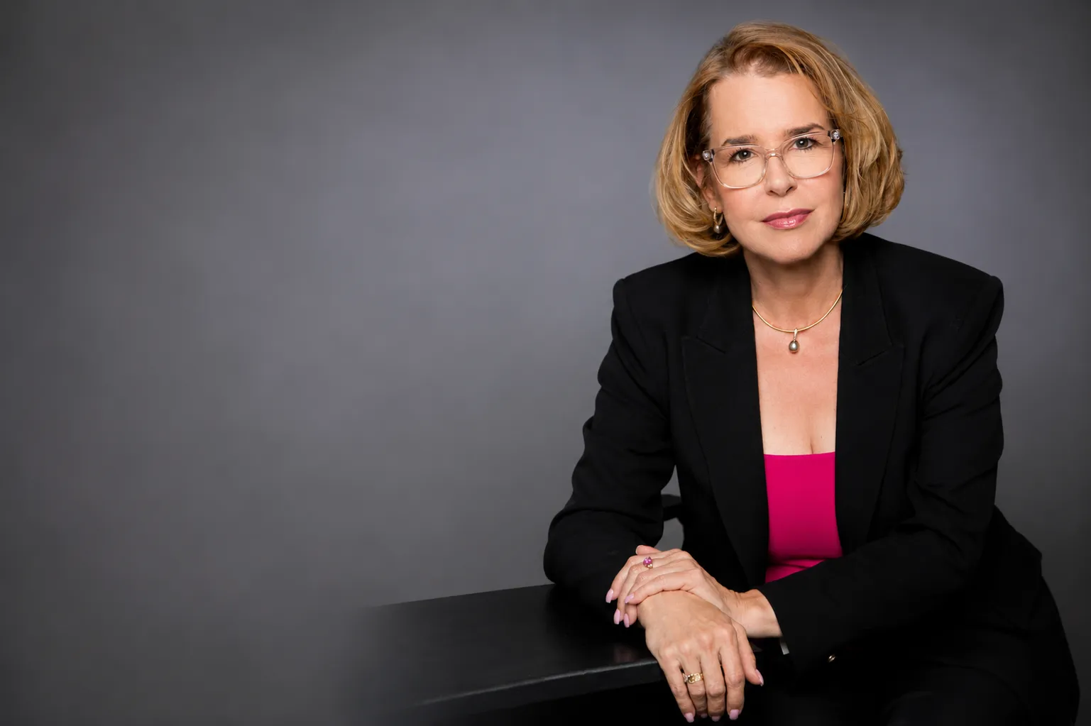 Dr. Lexi smiling in a professional portrait